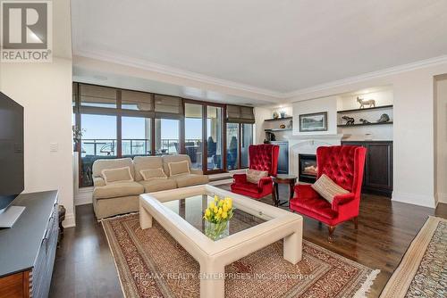 416 - 2095 Lake Shore Boulevard W, Toronto, ON - Indoor Photo Showing Living Room With Fireplace
