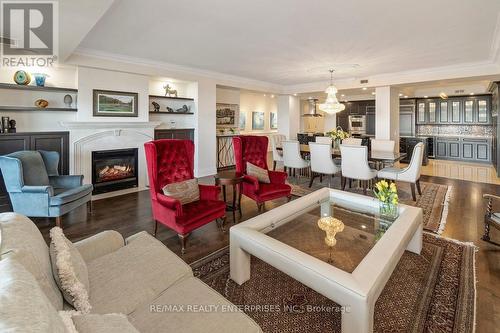 416 - 2095 Lake Shore Boulevard W, Toronto, ON - Indoor Photo Showing Living Room With Fireplace