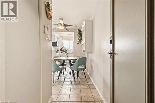 Dining room with ceiling fan and light tile patterned floors - 2373 E King Street E Unit# 45, Hamilton, ON - Indoor