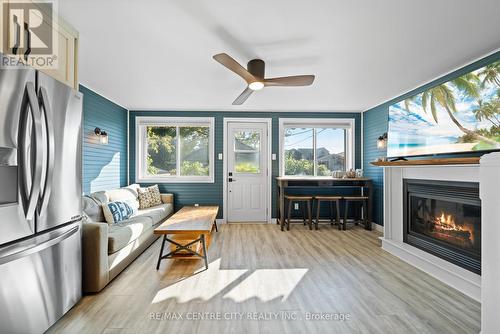417 Edith Cavell Boulevard, Central Elgin, ON - Indoor Photo Showing Living Room With Fireplace