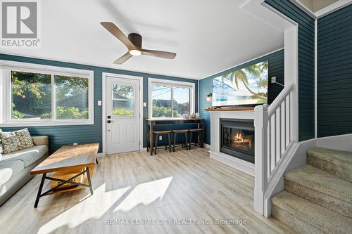 417 Edith Cavell Boulevard, Central Elgin, ON - Indoor Photo Showing Living Room With Fireplace