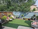 111 2501 Windsor Park Road, Regina, SK  - Outdoor With Deck Patio Veranda With Backyard 