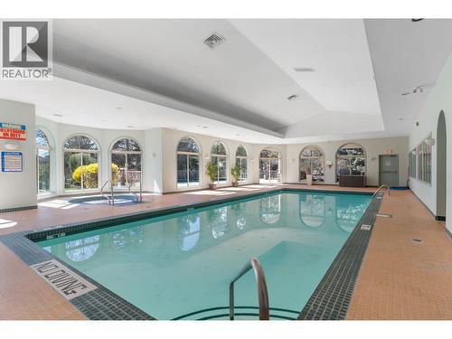 550 Yates Road Unit# 432, Kelowna, BC - Indoor Photo Showing Other Room With In Ground Pool
