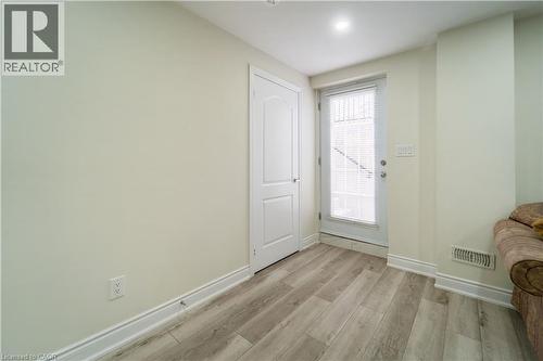 Entrance foyer featuring light wood-style floors and baseboards - 150 Goodwin Crescent Unit# Bsmt, Milton, ON - Indoor Photo Showing Other Room
