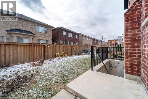 Fenced yard with a patio area - 150 Goodwin Crescent Unit# Bsmt, Milton, ON - Outdoor