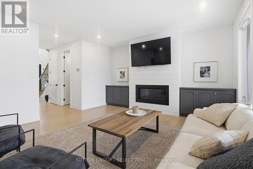 1886 Fountain Grass Drive, London South (South B), ON - Indoor Photo Showing Living Room With Fireplace