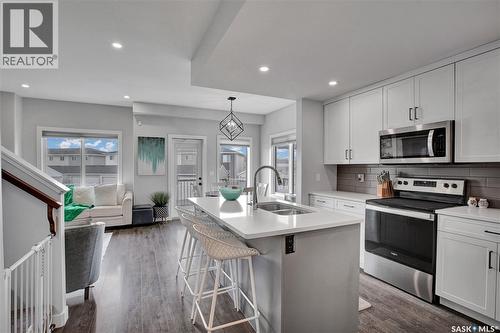 134 Germain Court, Saskatoon, SK - Indoor Photo Showing Kitchen With Stainless Steel Kitchen With Double Sink With Upgraded Kitchen