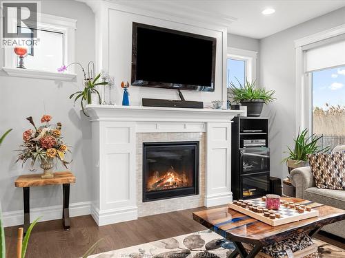 65 Augustus, Lasalle, ON - Indoor Photo Showing Living Room With Fireplace