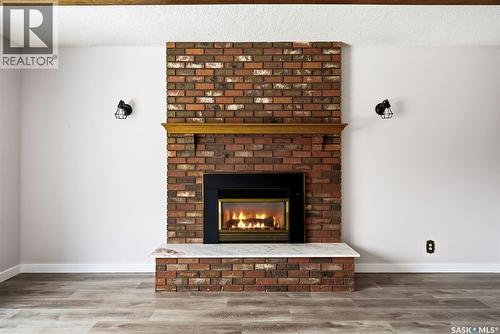 30 Dalhousie Way, Regina, SK - Indoor Photo Showing Living Room With Fireplace