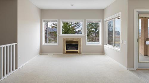 14-2300 Silver Place, Kelowna, BC - Indoor With Fireplace