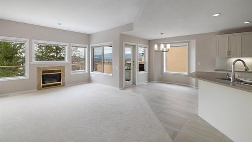 14-2300 Silver Place, Kelowna, BC - Indoor With Fireplace