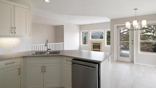 14-2300 Silver Place, Kelowna, BC - Indoor Photo Showing Kitchen With Double Sink