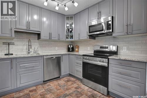 119 Spinks Drive, Saskatoon, SK - Indoor Photo Showing Kitchen With Upgraded Kitchen