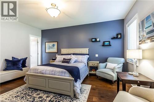 Bedroom with wood finished floors - 72 Pond View Gate, Waterdown, ON - Indoor Photo Showing Bedroom