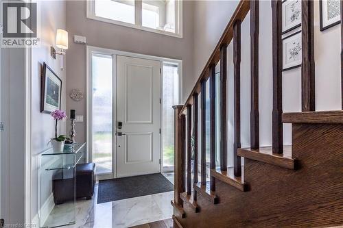 Entryway with healthy amount of natural light and dark marble finish flooring - 72 Pond View Gate, Waterdown, ON - Indoor Photo Showing Other Room