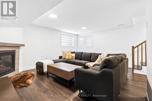 112 Jardiniere Street, Ottawa, ON - Indoor Photo Showing Living Room With Fireplace