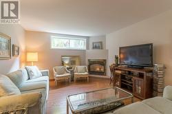 BRIGHT LIVING ROOM - 21'8 X 12' - GAS FIREPLACE - 