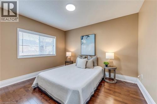 Bedroom featuring dark wood-style floors - 5811 Page Crescent, Burlington, ON - Indoor Photo Showing Bedroom