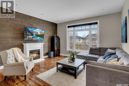 262 Blue Sage Drive, Moose Jaw, SK - Indoor Photo Showing Living Room With Fireplace