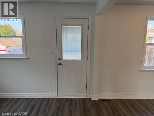 Entrance foyer featuring dark wood finished floors - 322 Upper Gage Avenue, Hamilton, ON - Indoor Photo Showing Other Room