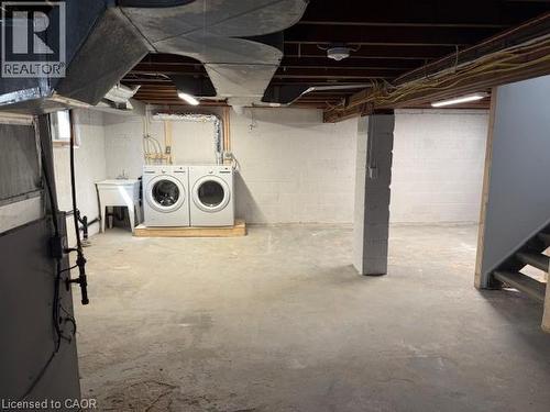 Unfinished basement with separate washer and dryer and heating unit - 322 Upper Gage Avenue, Hamilton, ON - Indoor