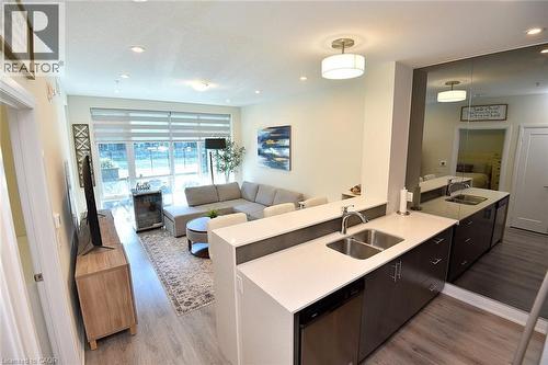16 Concord Place Unit# 145, Grimsby, ON - Indoor Photo Showing Kitchen With Double Sink