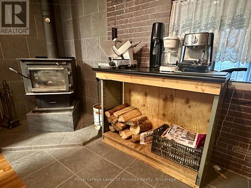Wood Stove for Warmth All Year - 112 510 Highway, Magnetawan, ON - Indoor Photo Showing Other Room