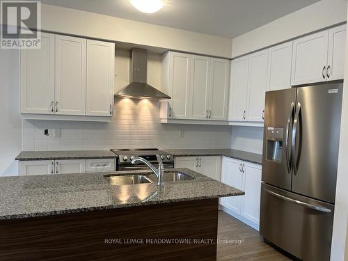 45 Eberhardt Drive E, Wasaga Beach, ON - Indoor Photo Showing Kitchen With Double Sink With Upgraded Kitchen