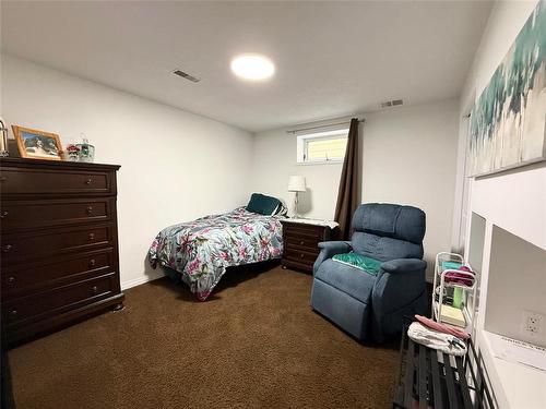 9 Waterloo Crescent, Brandon, MB - Indoor Photo Showing Bedroom