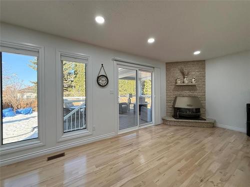 9 Waterloo Crescent, Brandon, MB - Indoor With Fireplace