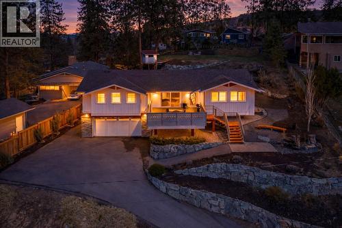 Twilight setting *virtual rendering - 488 Sheila Crescent, Kelowna, BC - Outdoor With Deck Patio Veranda