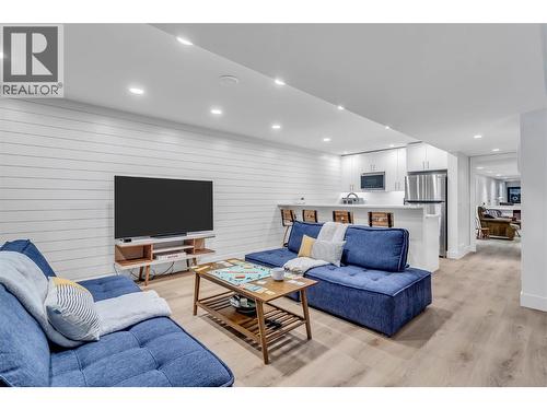 Lower level living with kitchen and separate entrance from outside and from garage - 2376 Saucier Road, Kelowna, BC - Indoor Photo Showing Living Room