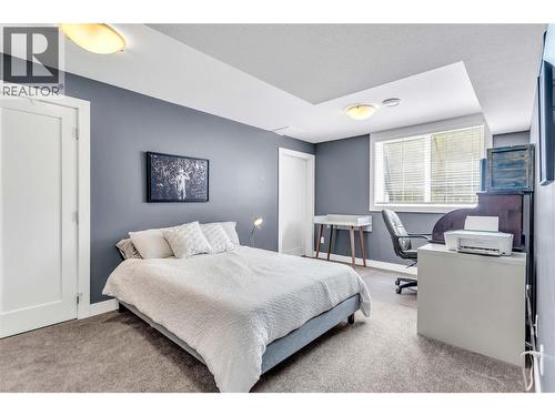 Lower level bedroom - 2376 Saucier Road, Kelowna, BC - Indoor Photo Showing Bedroom
