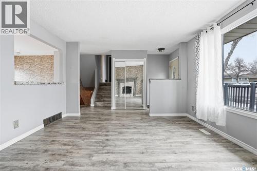3 Carson Road, Regina, SK - Indoor Photo Showing Other Room With Fireplace