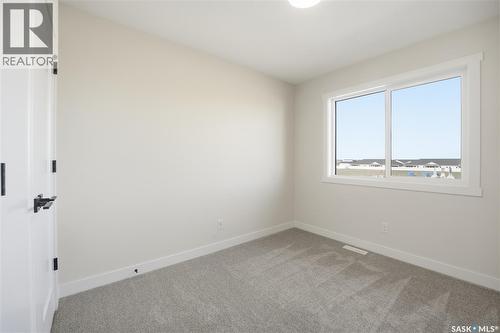 14 Taskamanwa Terrace, Saskatoon, SK - Indoor Photo Showing Other Room