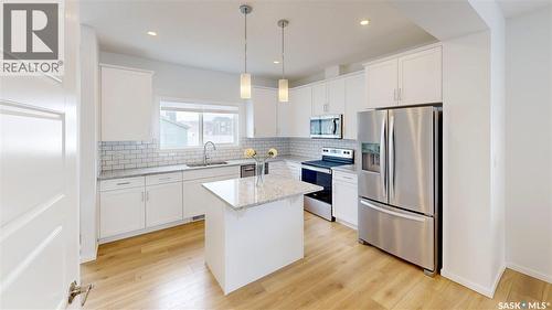 3100 Crosbie Crescent, Regina, SK - Indoor Photo Showing Kitchen With Stainless Steel Kitchen With Upgraded Kitchen