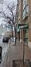 View of asphalt street with sidewalks, curbs, and traffic signs - 132 Front Street E Unit# #1-B, Toronto, ON 
