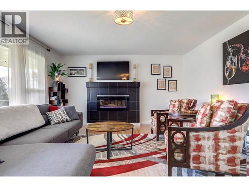 9811 Venables Drive, Vernon, BC - Indoor Photo Showing Living Room With Fireplace