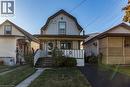 Colonial inspired home featuring a gambrel roof, covered porch, and a front lawn - 23 Frederick Avenue, Hamilton, ON  - Outdoor With Deck Patio Veranda 