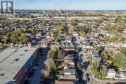 Aerial view of property's location with nearby suburban area - 
