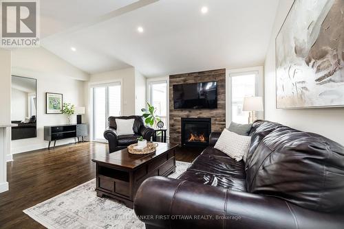 211 Purchase Crescent, Ottawa, ON - Indoor Photo Showing Living Room With Fireplace