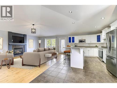 Virtually staged main living area - 546 South Crest Drive Lot# 1, Kelowna, BC - Indoor With Fireplace