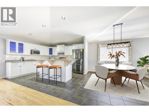 Virtually staged kitchen & dining room - 546 South Crest Drive Lot# 1, Kelowna, BC - Indoor