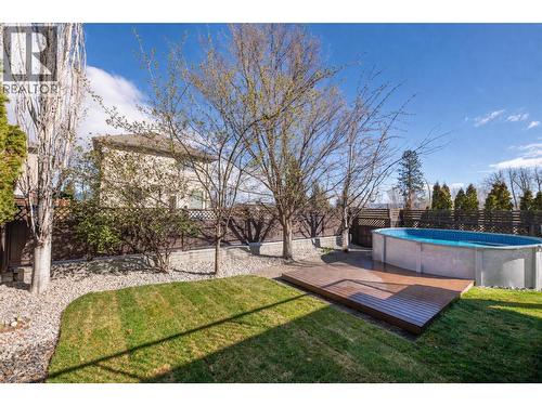 Virtually staged with pool open in backyard - 546 South Crest Drive Lot# 1, Kelowna, BC - Outdoor With Above Ground Pool With Backyard