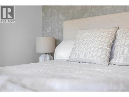 Bedroom 1. Photos may be of a similar home in the community. - 1455 Cara Glen Court Unit# 135, Kelowna, BC - Indoor Photo Showing Bedroom