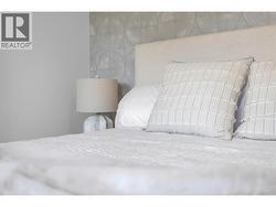 Bedroom 1. Photos may be of a similar home in the community. - 