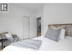Bedroom 2. Photos may be of a similar home in the community. - 