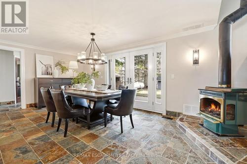 1189 Britannia Road, Burlington, ON - Indoor Photo Showing Dining Room With Fireplace