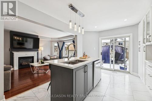 3 Booth Crescent, Ajax, ON - Indoor Photo Showing Kitchen With Fireplace With Double Sink