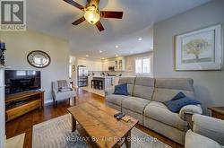 Hardwood floors, california shutters on main level - 
